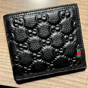 Gucci wallet. Please let me know of any questions.